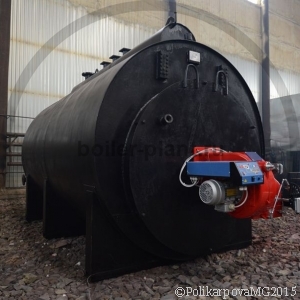 Котел паровой КП-700 газовый производительностью 700 кг/пара в час, температурой 115 °С, давлением 0,07 МПа, тепловой мощностью 0,52 МВт. Работает с горелкой Unigas.